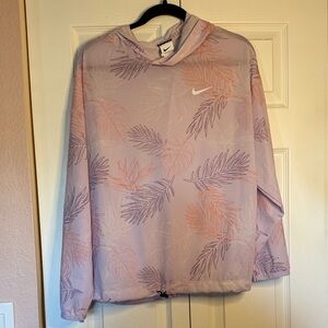 Nike Pro Cover Up Hoodie in a purple aloha print. Size L